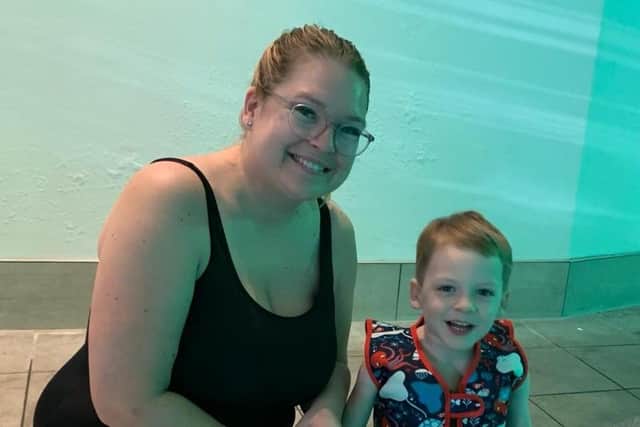 reggie at baby swim school class